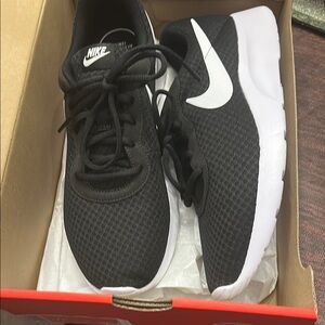 Nike Black Mesh Sneakers with White Swoosh
